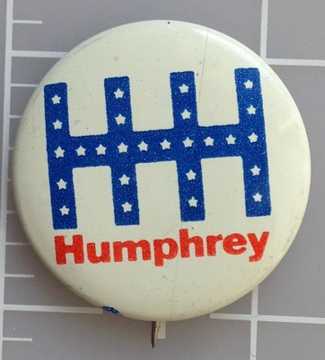 1.25 inch HHH white Humphrey campaign button with union bug on lower left front