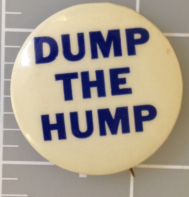 1.25 inch Dump the Hump white campaign button with blue lettering