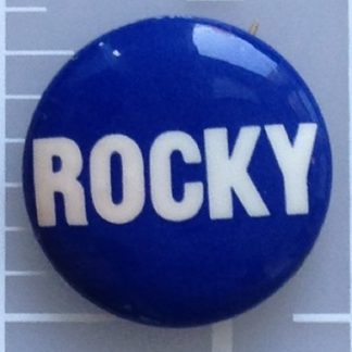 Rocky blue lithograph campaign button. Blue with white lettering
